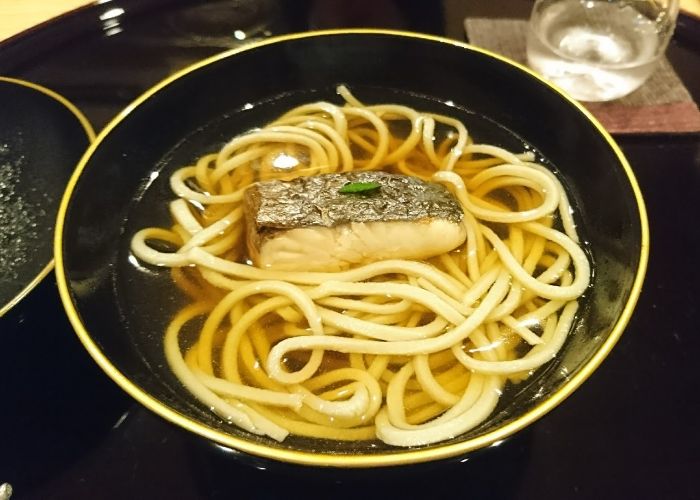 Michelin star soba at Yuan Yamori, with grilled salmon resting on top of soba.